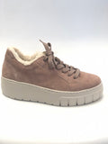 Pinkish Brown suede sneaker with white sole on a light gray background