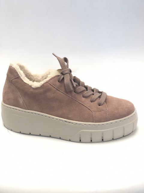 Pinkish Brown suede sneaker with white sole on a light gray background